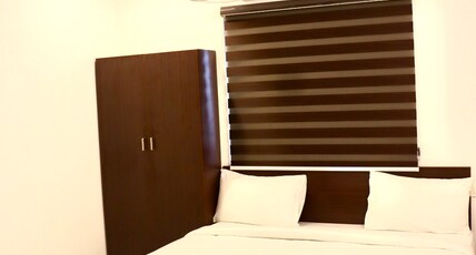 Hotel Rhythms - Near trade centre Manapakkam Room Type - Double Deluxe Room