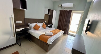 DHOLIA RESIDENCY Room Type - DELUXE ROOM