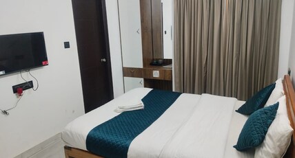 Collection O Thanisandra Bangalore Formerly Surya Manyatha Room Type - Deluxe Room
