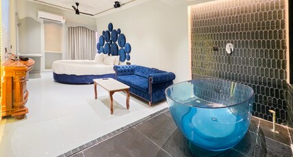 Hotel Nova Bloom Room Type - Netflix Suite with in Room Jacuzzi Bubble Bath Massage Tub and Projector with Speaker