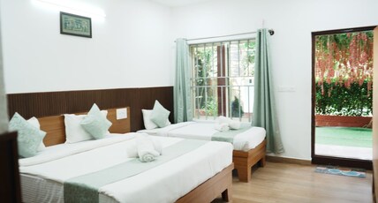 The Blossom Coorg Resort Room Type - Deluxe Triple Room