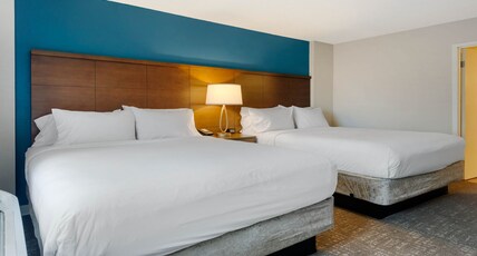 Staybridge Suites CALGARY AIRPORT, an IHG hotel Room Type - 1 Bedroom Suite 2 Queen Single Sofa Bed