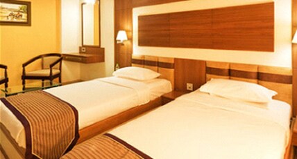 Ponnis Grand Inn Room Type - Deluxe Room