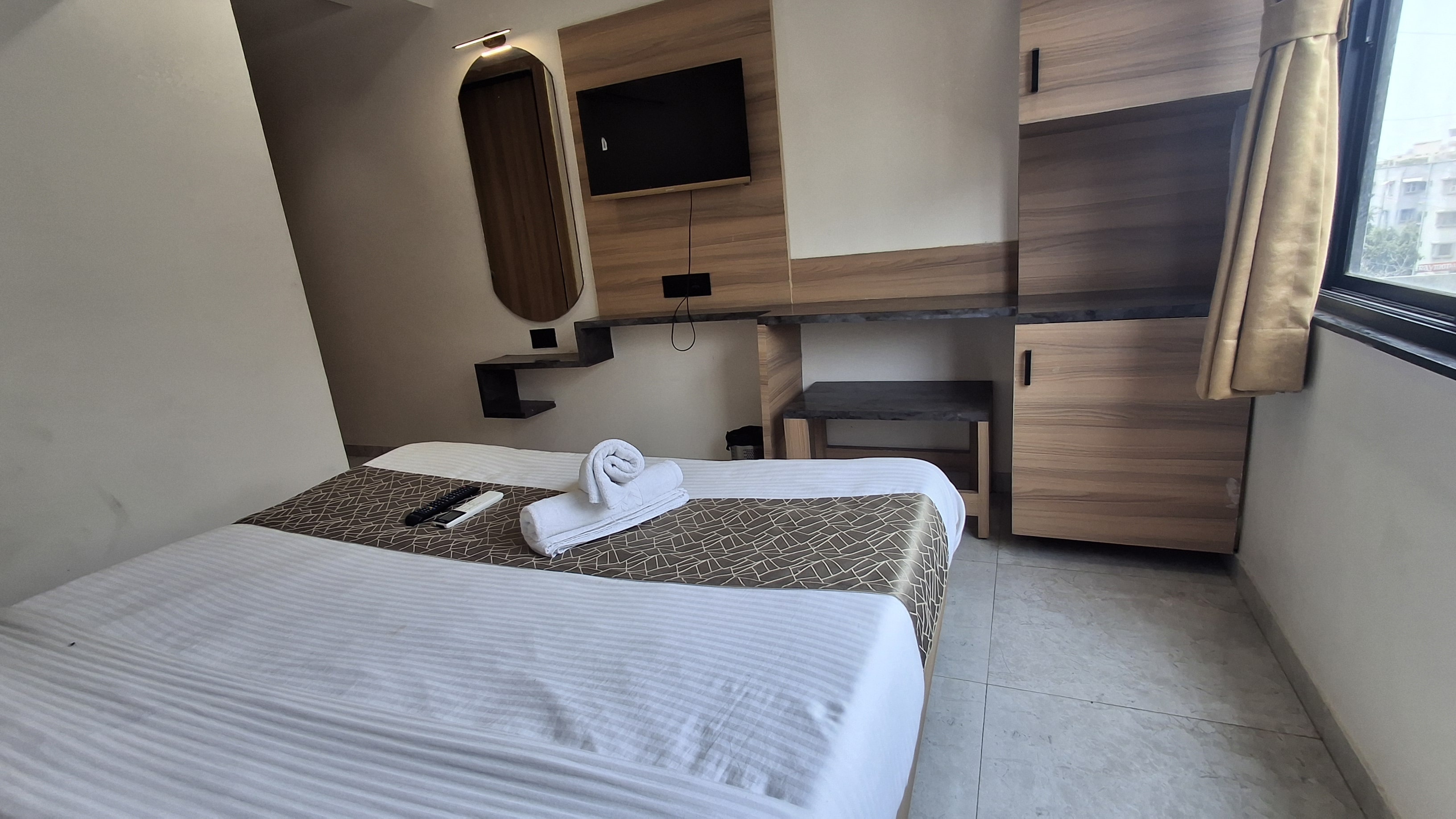 Hotel RK Rooms - Tap to explore photos