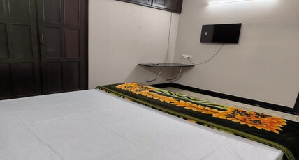 Karthikeya Suites Room Type - Deluxe Non-AC Room