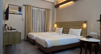 Hotel Gulmohar Grand Room Type - Premium Room Twin Bed