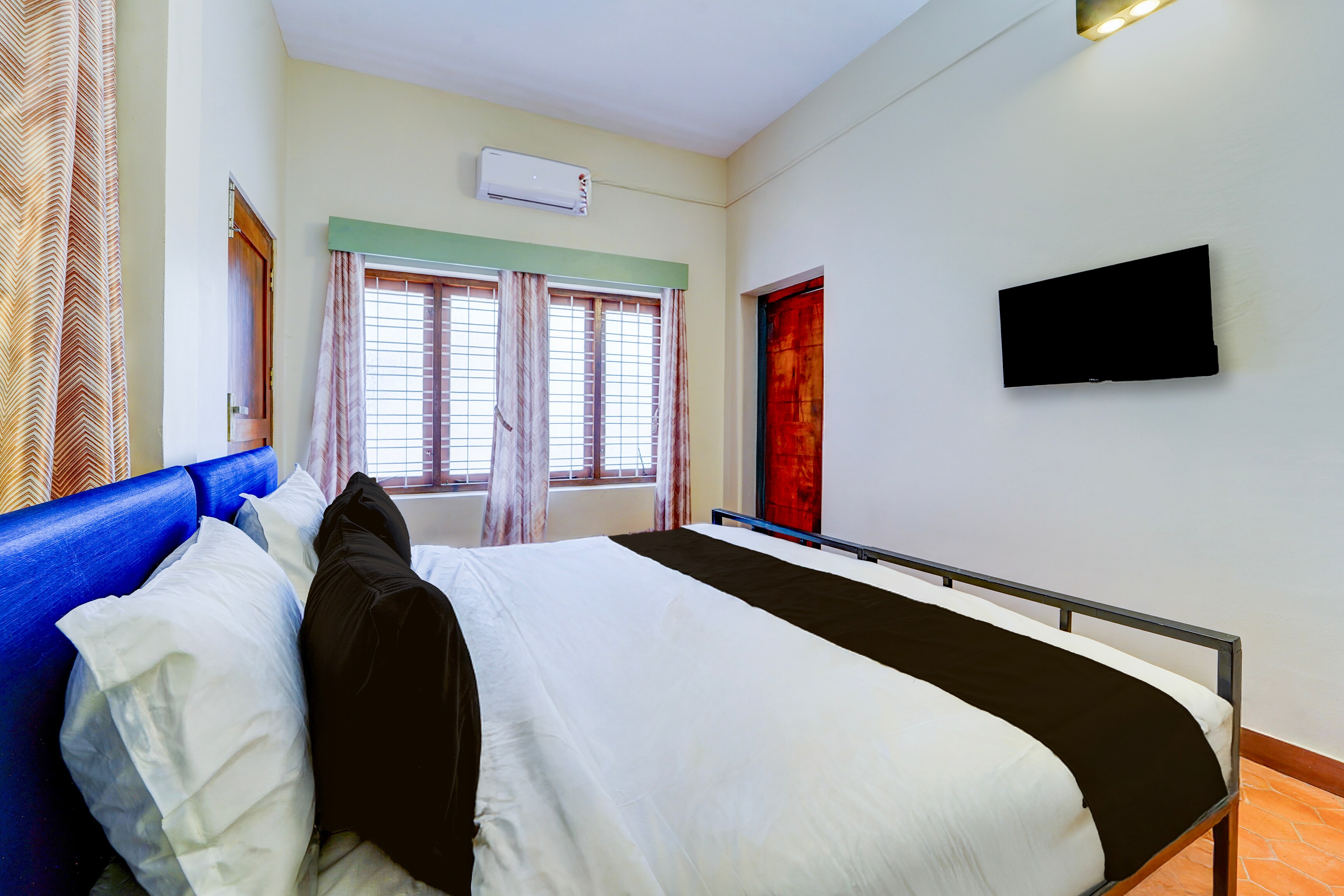 Super Hotel O CSIR Pappanamcode Formerly Ambadi Guest House - Tap to explore photos