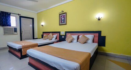 Trimurti Height 500 mtrs from Puri Railway Station Room Type - Superior Quadruple AC Room