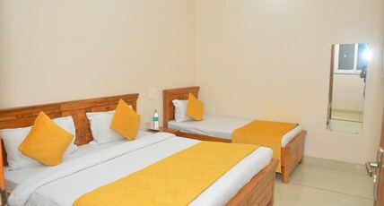 Hotel Hare Krishna Dham Room Type - Deluxe Triple Bed Room