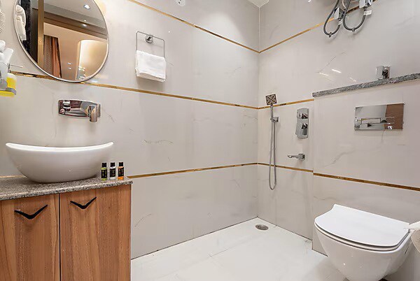 The Corporate Stays A Luxury Business Hotel at Golf Course Road - Tap to explore photos