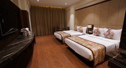Pride Hotel Bhopal Room Type - Premium Quadruple Room With City View