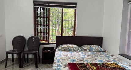 Niharika Homestay Room Type - Deluxe AC Double Room