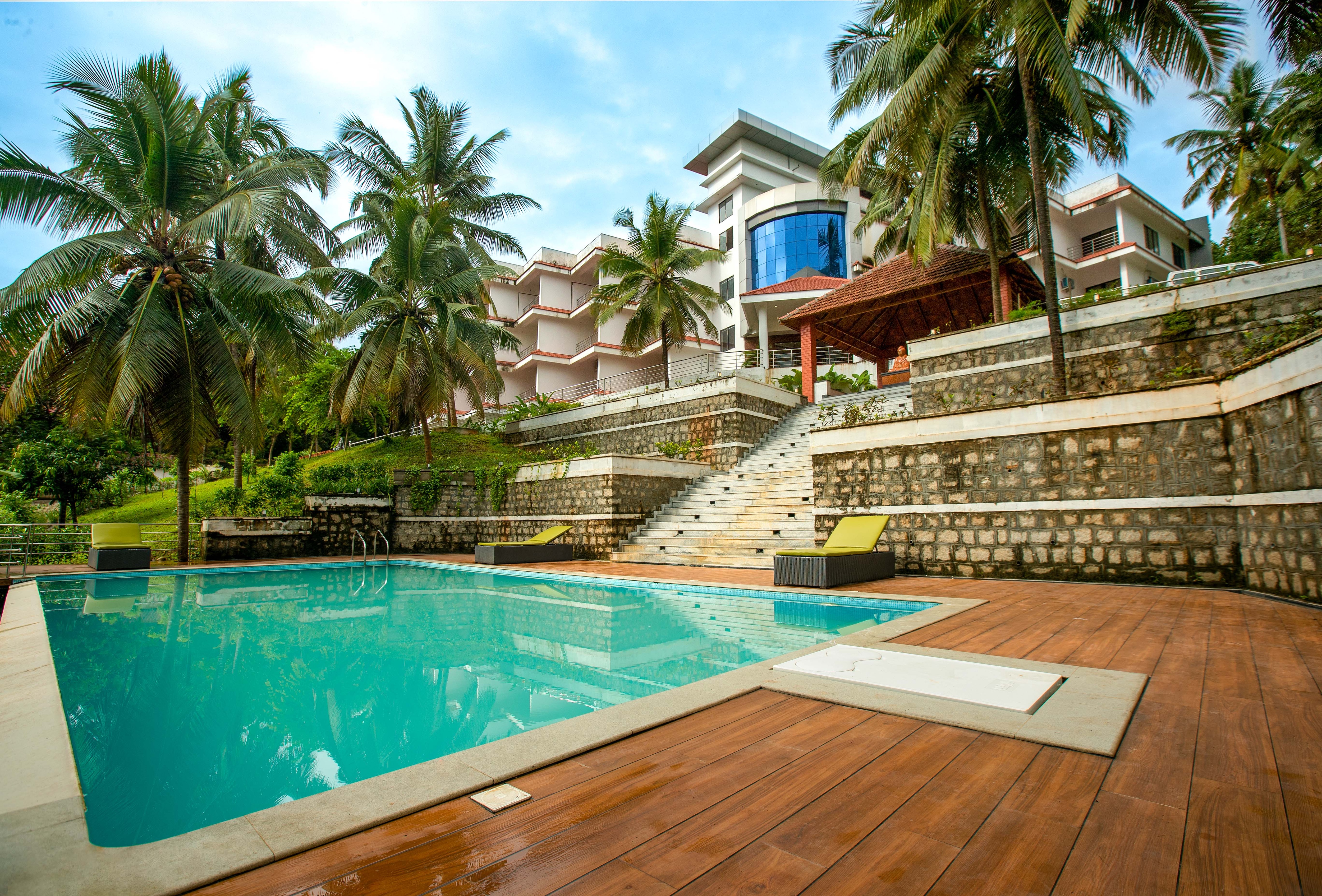 EZHIMALA AYURVEDA AND WELLNESS RESORT - Tap to explore photos