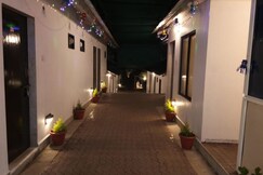 The Shanti Sadan Homestay | Rooms & Kitchen