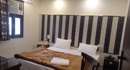 SHARDA INN Room Type - Deluxe King Bed Room