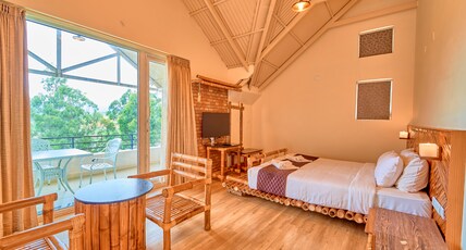 AJ Gable Cloud Cottages Ooty by VOYEHOMES Room Type - Bamboo Suite Balcony View Room