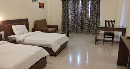 The Sravasti Residency Room Type - Deluxe Room
