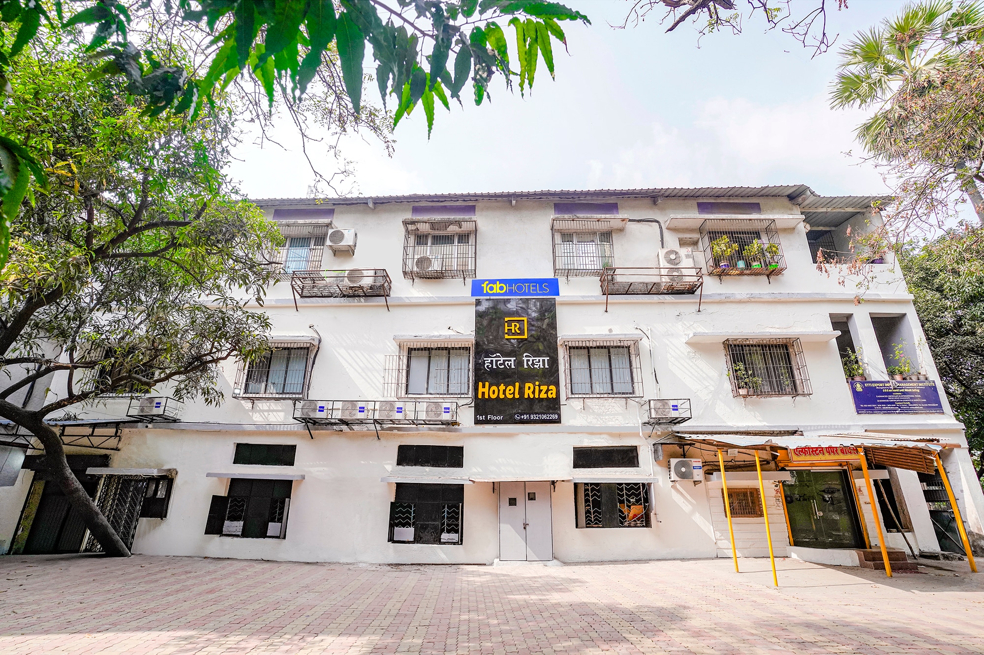 Hotel Riza International - Tap to explore photos