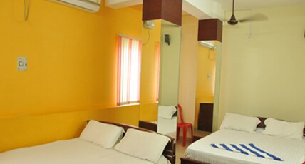 MANGAI TOWERS Room Type - AC Room