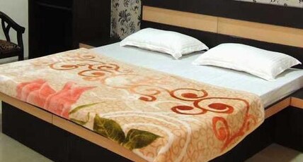 Hotel Tushar Residency Room Type - Deluxe Room