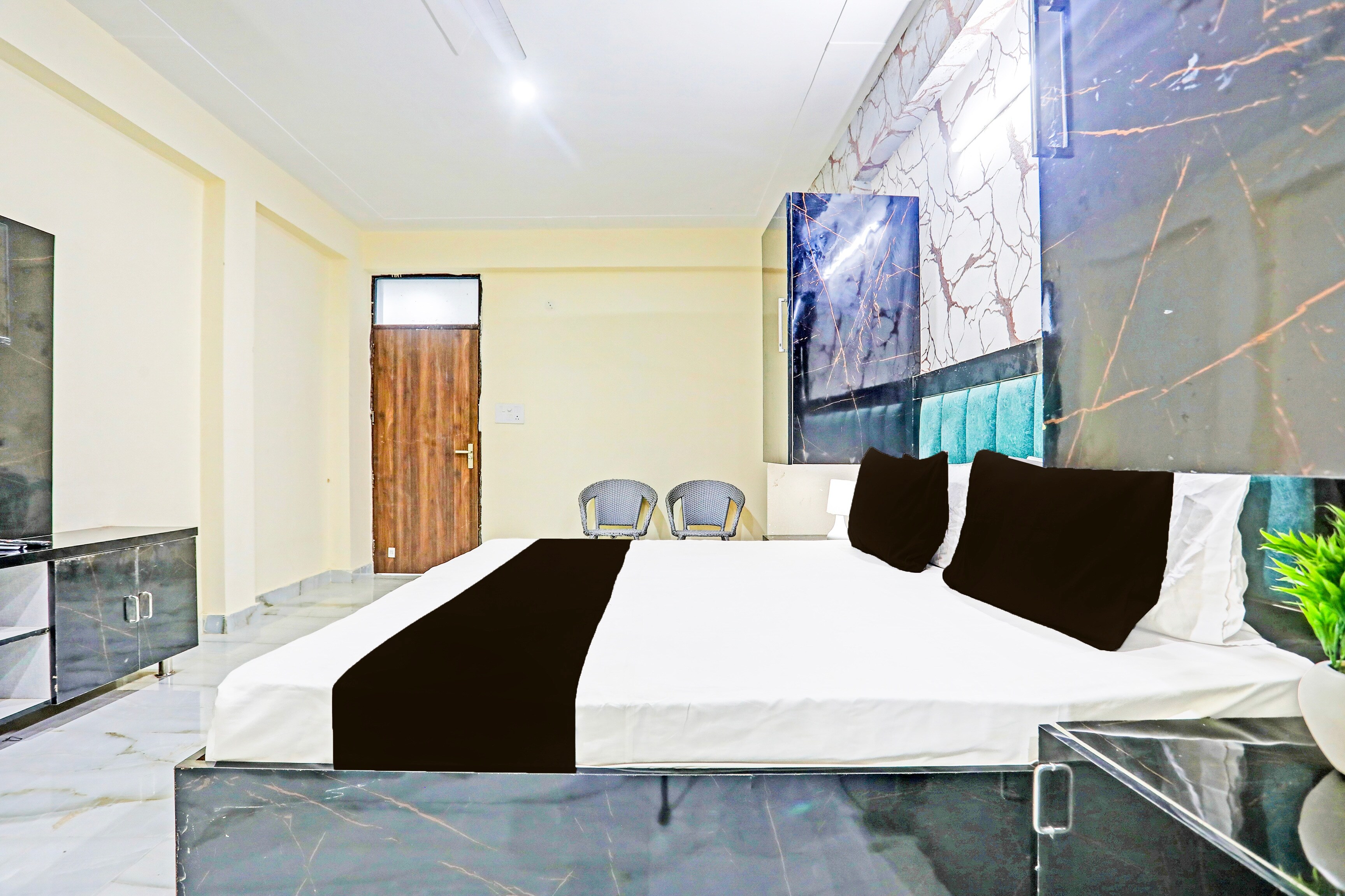 Hotel O AV HOMES U BLOCK - Tap to explore photos