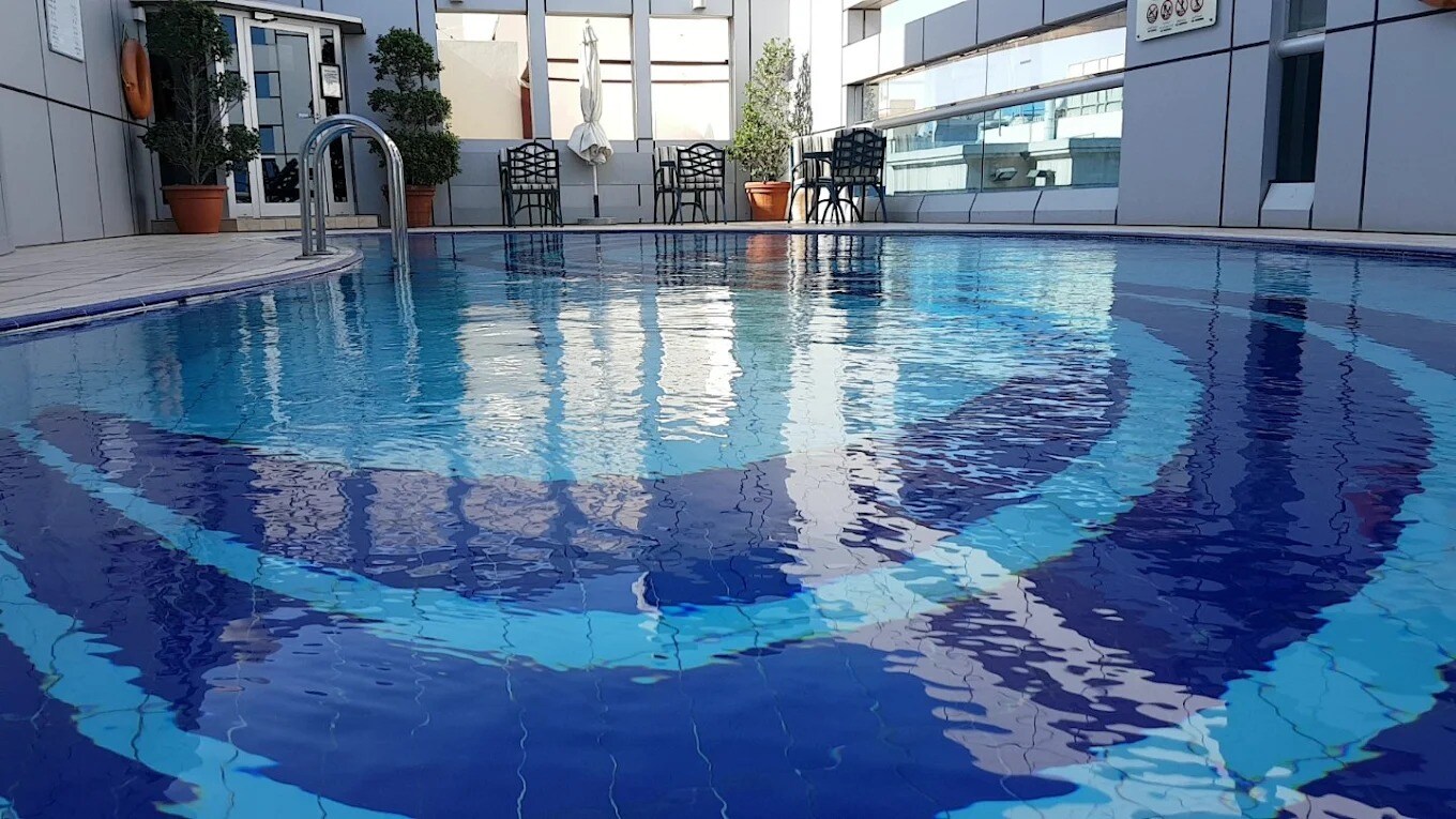 Al Manzel Hotel Apartments - Tap to explore photos