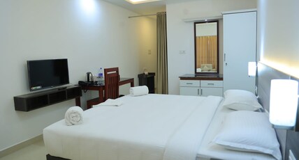 RJ ROSS RAMAPURAM RESIDENCY Room Type - AC Deluxe Double room RJ ROSS RAMAPURAM RESIDENCY Room Type - AC Deluxe Double room