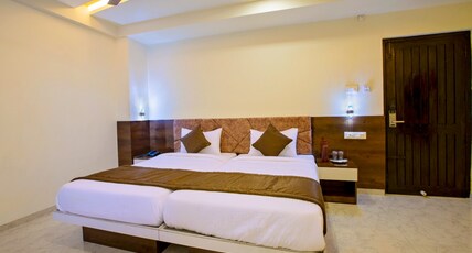 IVY RESIDENCY Room Type - SUITE TWIN  AC