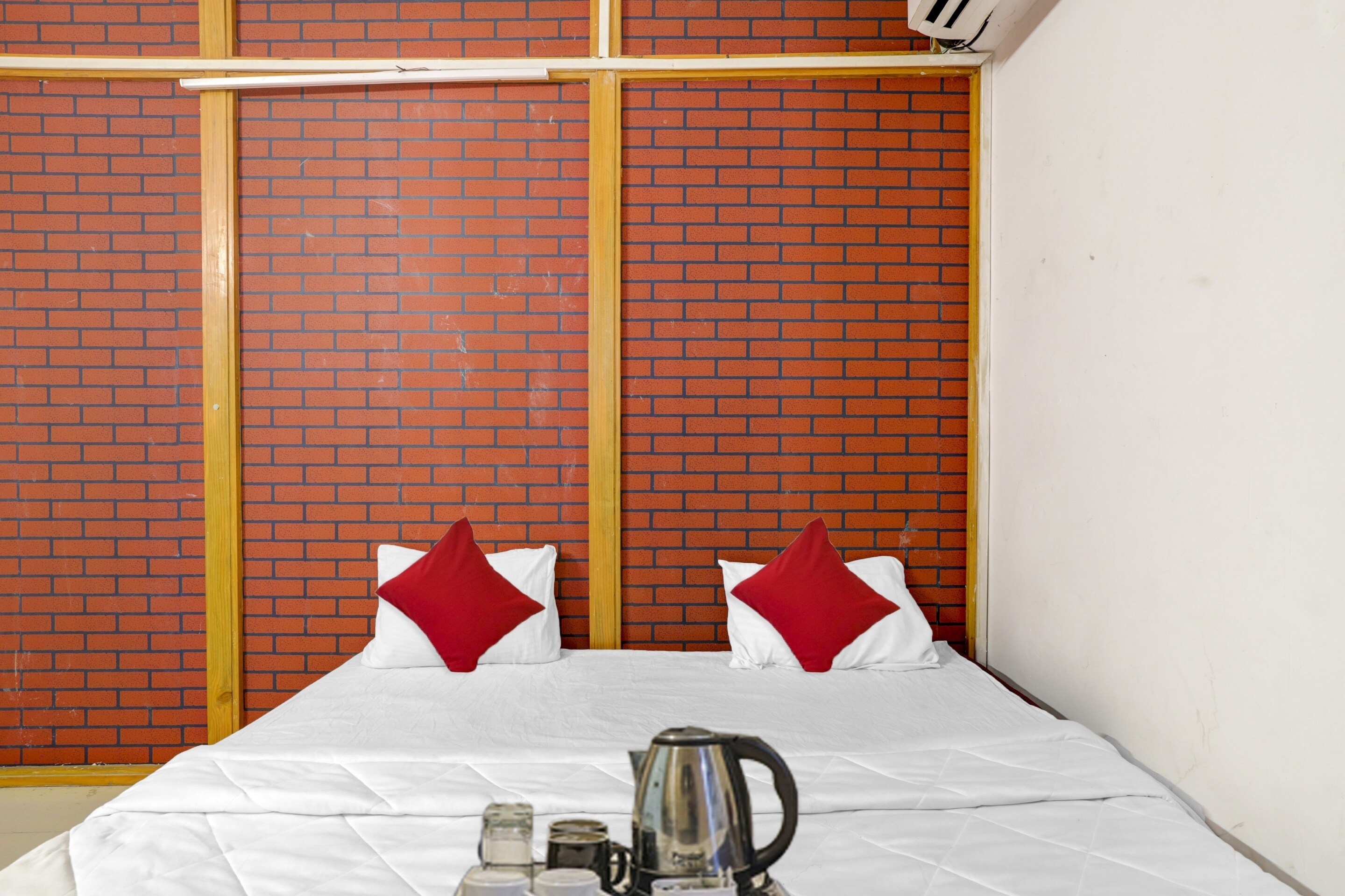 Hotel O Cozy Rooms - Tap to explore photos