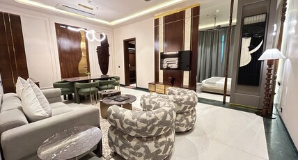 OMAYA SUITES Room Type - Executive Suite King Bed City View Balcony