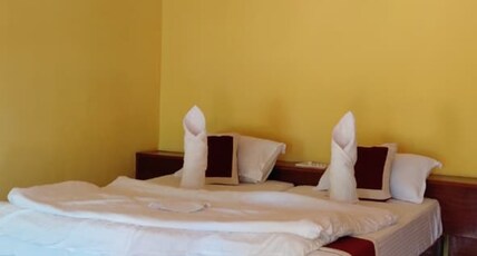 TOP IN TOWN HIGHWAY RESTAURANT AND HOTELS Room Type - AC Cottage