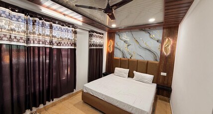 RR Heights Near Bhagsu Waterfall Room Type - Deluxe Room With Balcony n Moutnain View