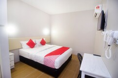Rooms of Hotel O iBC36 Business Stay