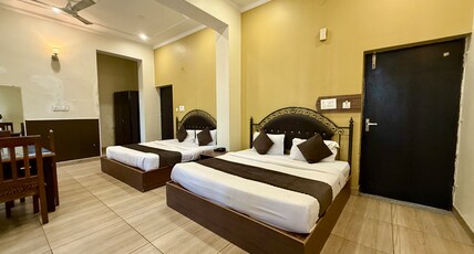 HOTEL TRIHARI (3 minutes drive to JANKI BRIDGE) Room Type - Family Room