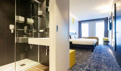 IBIS STYLES BASEL CITY Room Type - Standard room with 2 single beds and sofa bed IBIS STYLES BASEL CITY Room Type - Standard room with 2 single beds and sofa bed
