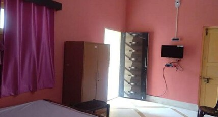 Devlok Residency Room Type - AC Room attached bathroom