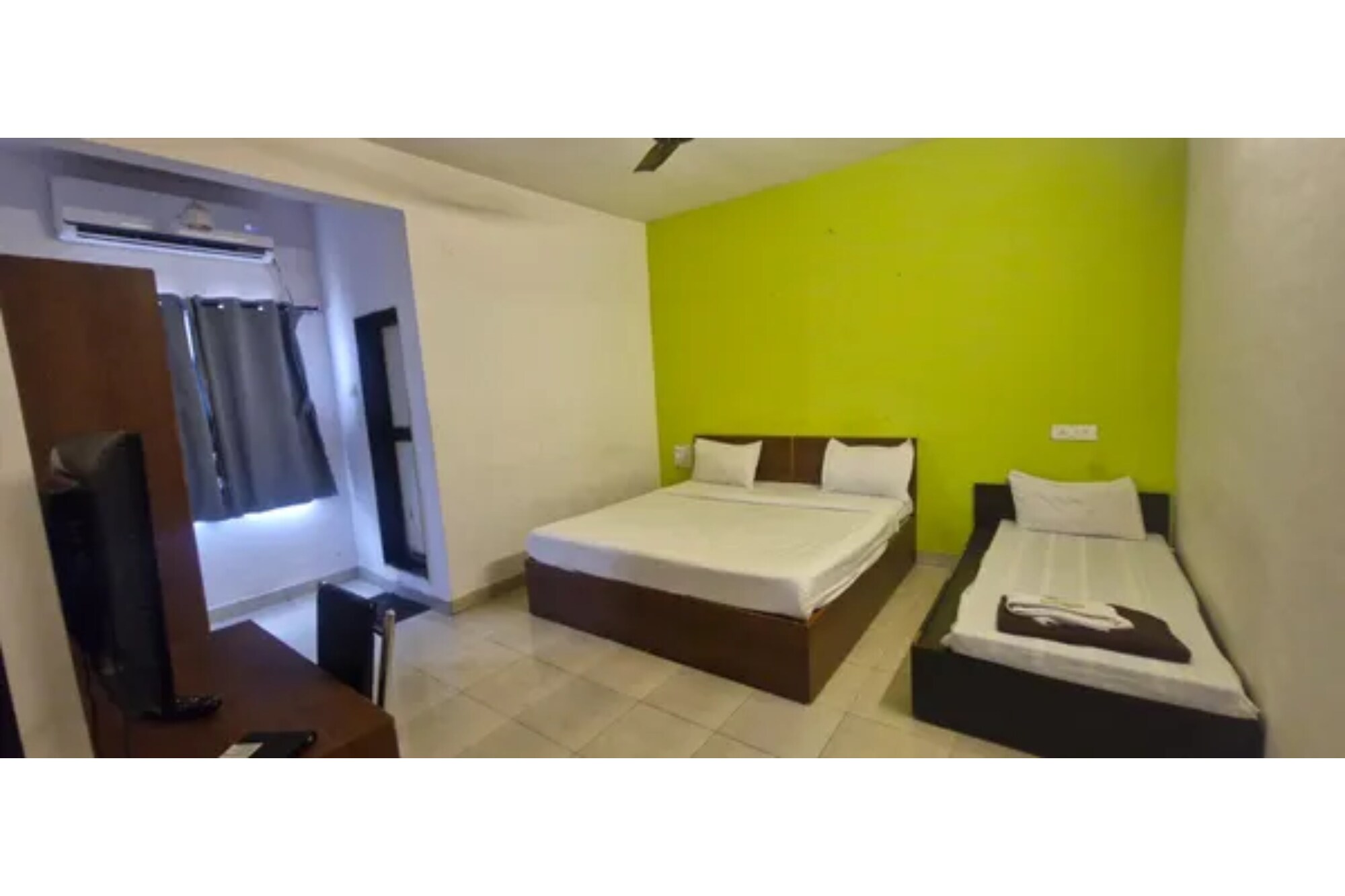 FabHotel Swara Heights - Tap to explore photos