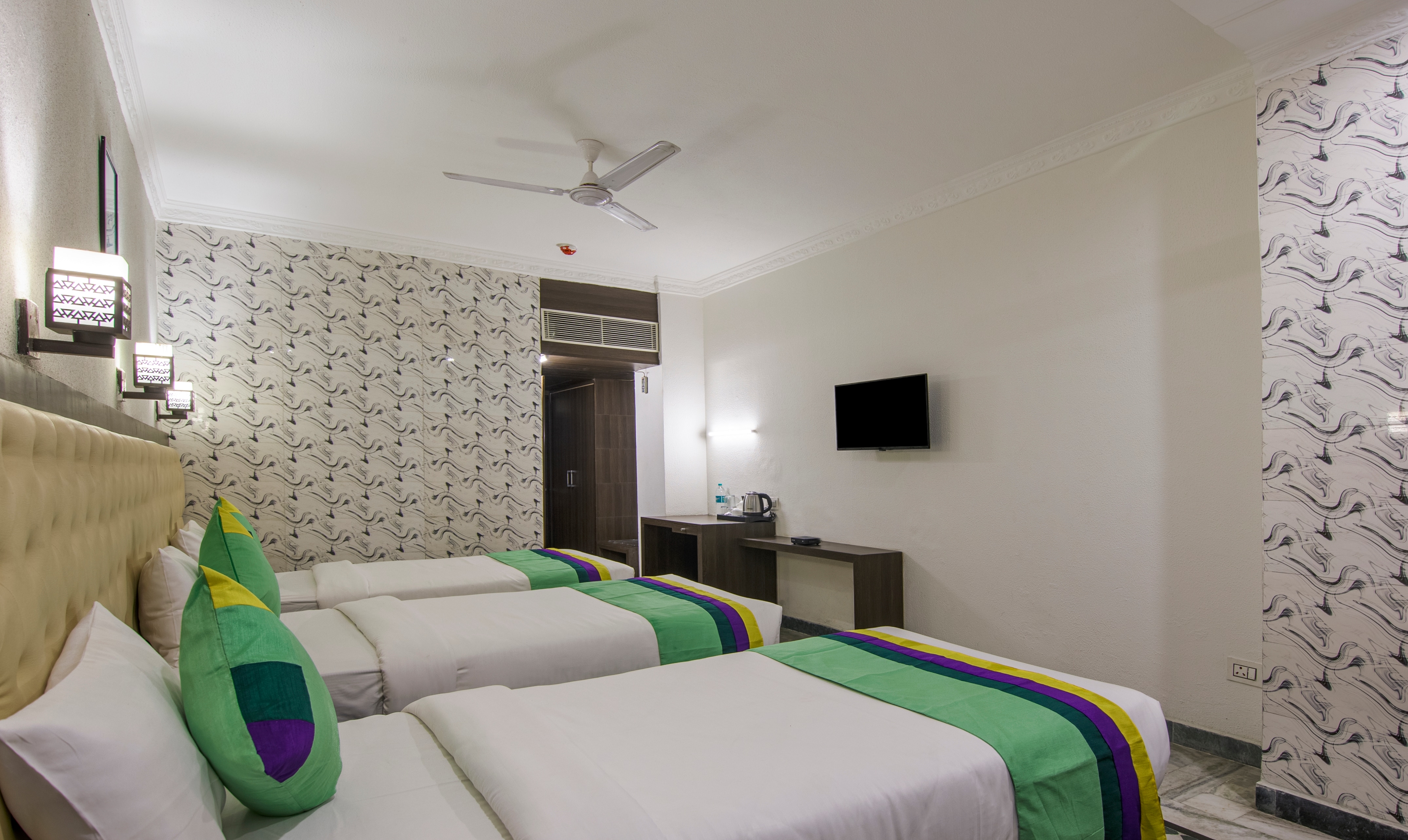 Treebo Trinetar International - Tap to explore photos