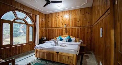 Green alpine jibhi Room Type - Deluxe Room
