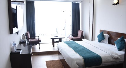 Rhodo Inn Hotel Room Type - Deluxe Room