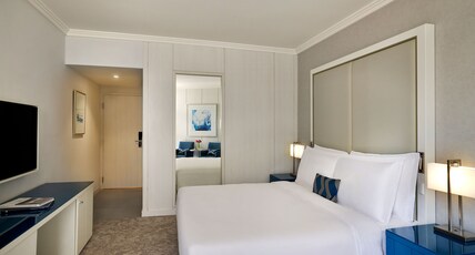 Beach Rotana Room Type - Guest Room with Balcony - King Bed Beach Rotana Room Type - Guest Room with Balcony - King Bed