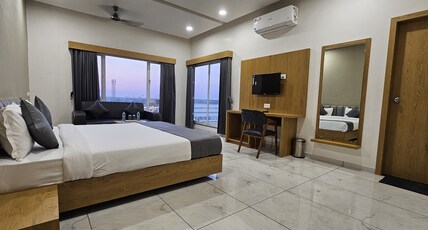 Hotel Amrut Inn Hospitalities Room Type - Deluxe Suite Room with Balcony Hotel Amrut Inn Hospitalities Room Type - Deluxe Suite Room with Balcony