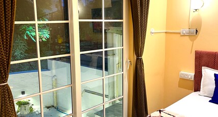 The BackpackStack Room Type - Superior Queen Room with Private Terrace Garden