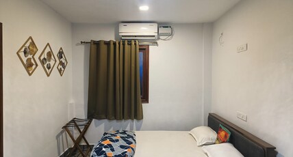 Half Orange Party Hostel by Pool side. Room Type - Premium Deluxe Room
