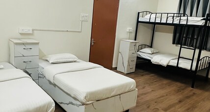 Elite stays viman nagar Room Type - Single bed in four sharing room