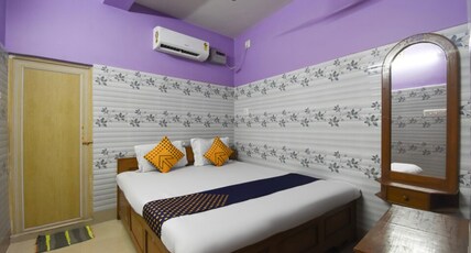 New Suvam Lodge and Hotel Room Type - Deluxe AC