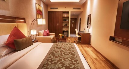 Rose Park Hotel Al Barsha Room Type - Deluxe King Room