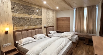 Hotel Vimukti Room Type - Four bed standard room