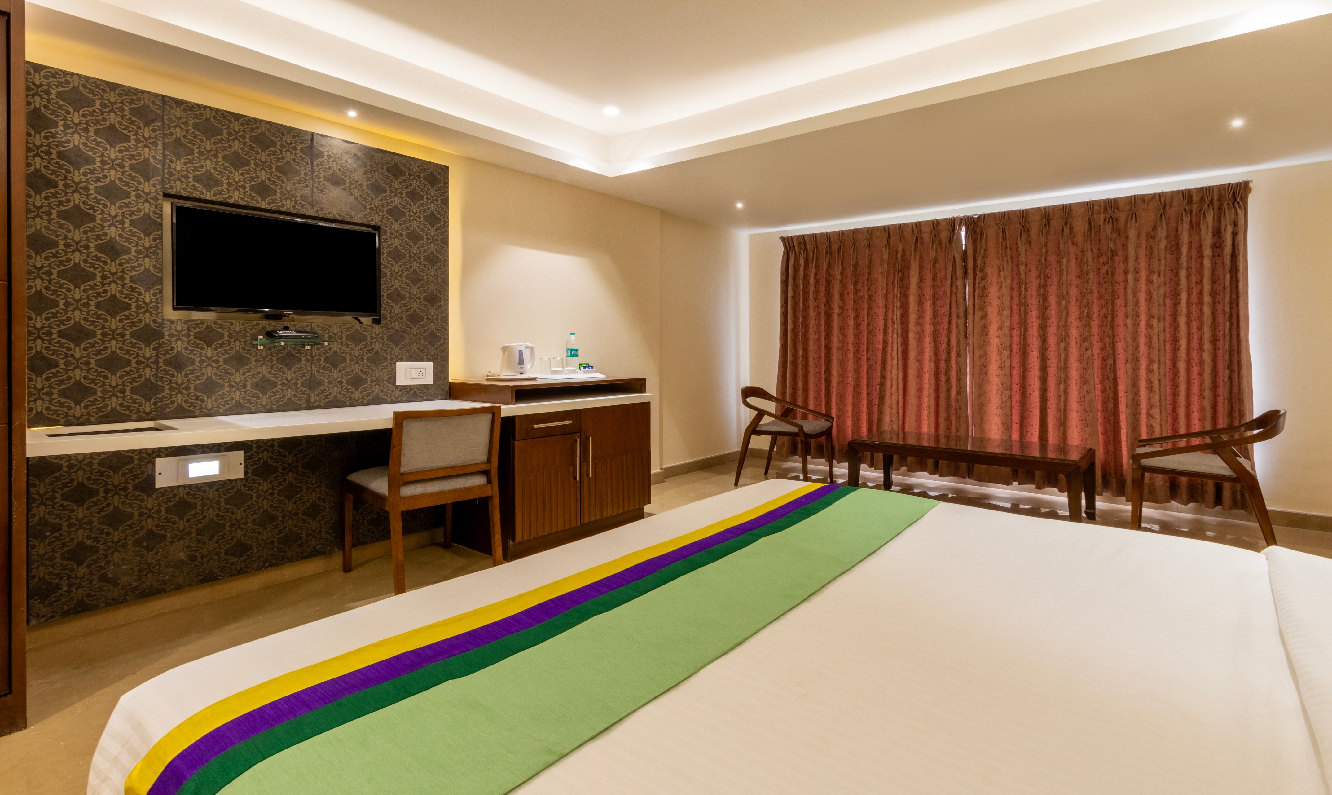 Treebo Suvarna Comforts - Tap to explore photos