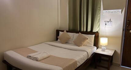 Aqua Wave by YogiTree Hotels Room Type - Deluxe Double Bed Room with Garden View Aqua Wave by YogiTree Hotels Room Type - Deluxe Double Bed Room with Garden View